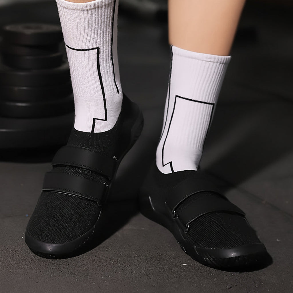 أحذية Ironstance بنعل مسطح — جزء علوي من قماش يسمح بالتهوية، ونعل متوسط الارتفاع